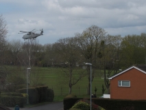 Helicopter (Merlin?) taking off from playing field during covid pandemic