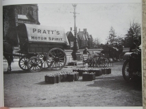 Pratt's motor spirit being delivered in cans (petrol)