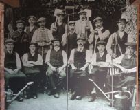 Mural using photo of estate workers at Hestercombe House, Somerset